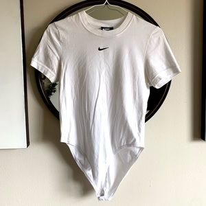 white Nike swoosh bodysuit (small)